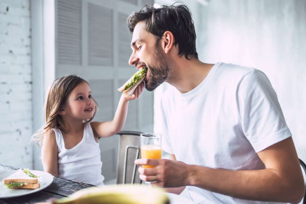 Dad with daughter at home